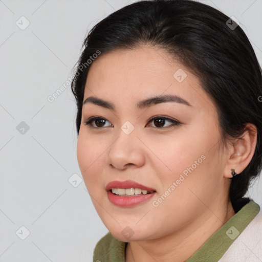 Joyful asian young-adult female with medium  brown hair and brown eyes