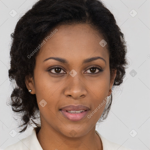 Joyful black young-adult female with long  brown hair and brown eyes