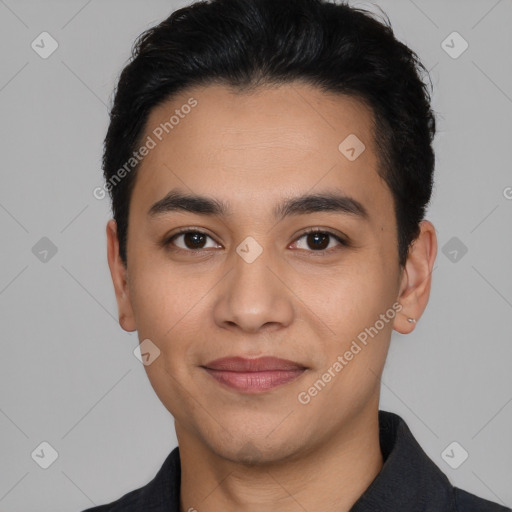 Joyful latino young-adult male with short  black hair and brown eyes