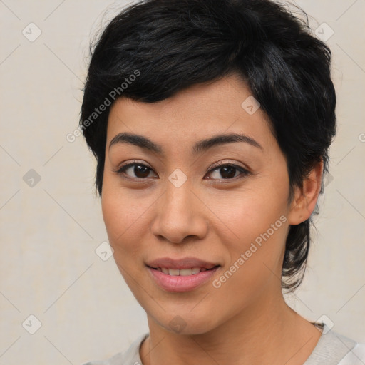 Joyful asian young-adult female with medium  black hair and brown eyes