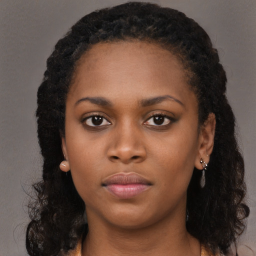 Neutral black young-adult female with long  black hair and brown eyes