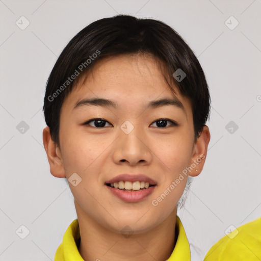 Joyful asian young-adult female with short  brown hair and brown eyes