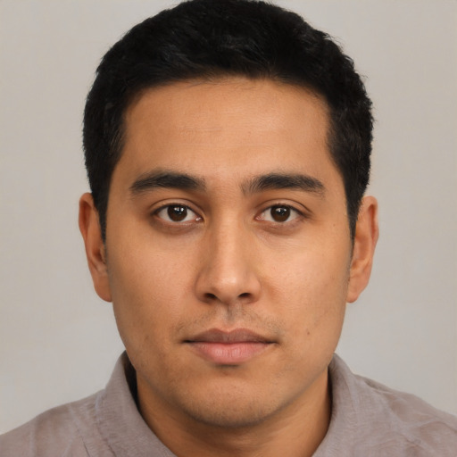 Neutral latino young-adult male with short  black hair and brown eyes