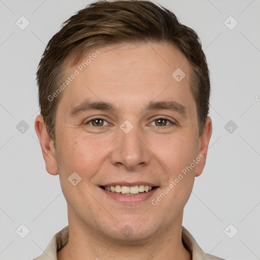 Joyful white young-adult male with short  brown hair and brown eyes