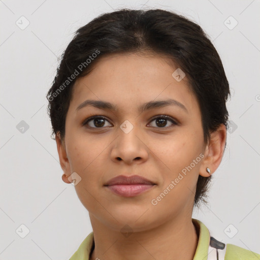 Joyful asian young-adult female with short  brown hair and brown eyes