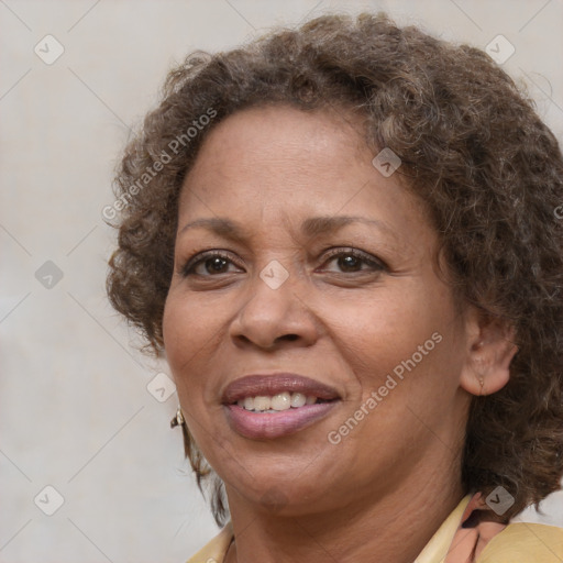 Joyful white adult female with short  brown hair and brown eyes