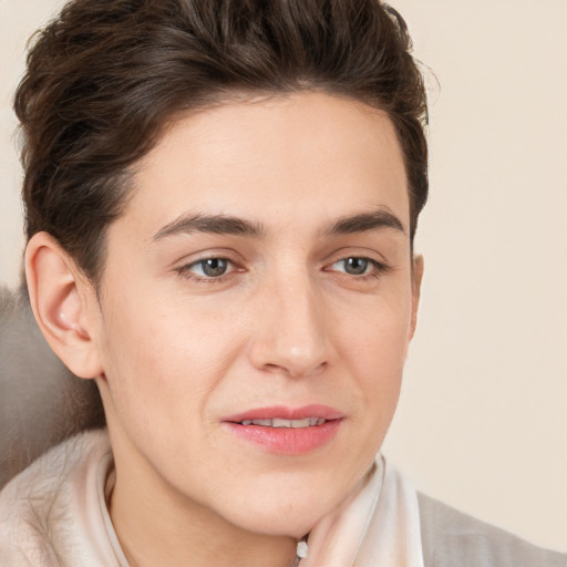 Joyful white young-adult male with medium  brown hair and brown eyes