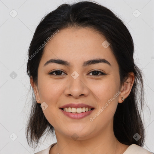 Joyful asian young-adult female with medium  brown hair and brown eyes