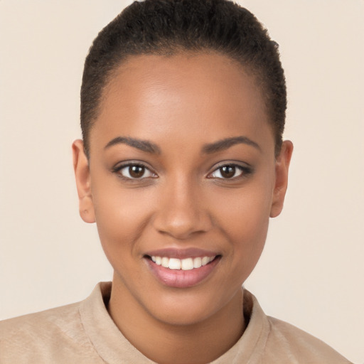 Joyful latino young-adult female with short  brown hair and brown eyes