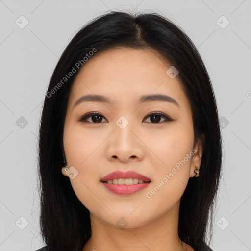 Joyful asian young-adult female with long  black hair and brown eyes