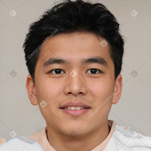 Joyful asian young-adult male with short  brown hair and brown eyes