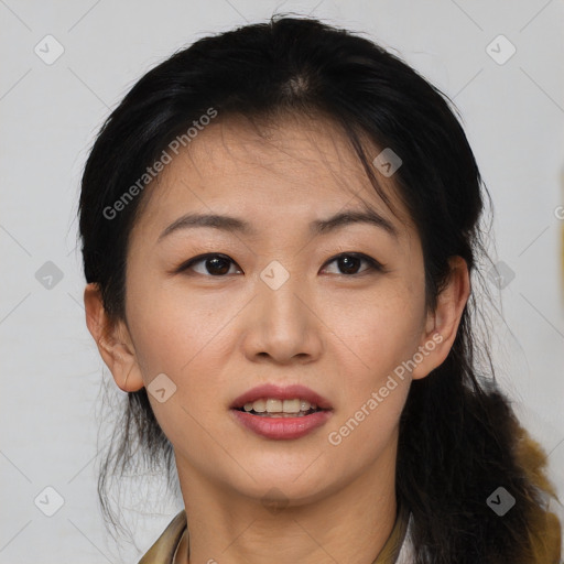 Joyful asian young-adult female with medium  black hair and brown eyes