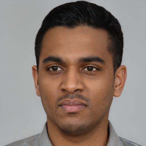 Neutral latino young-adult male with short  black hair and brown eyes