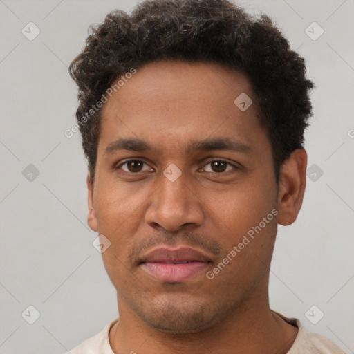 Neutral black young-adult male with short  brown hair and brown eyes