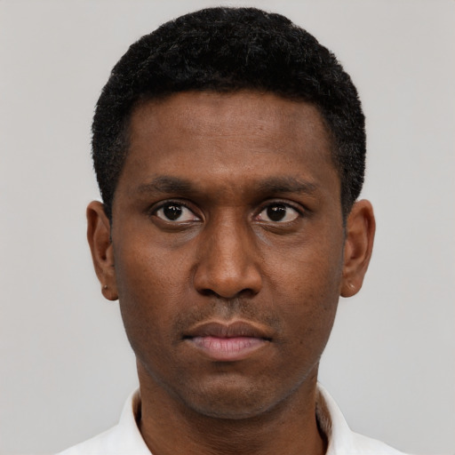 Neutral black young-adult male with short  black hair and brown eyes