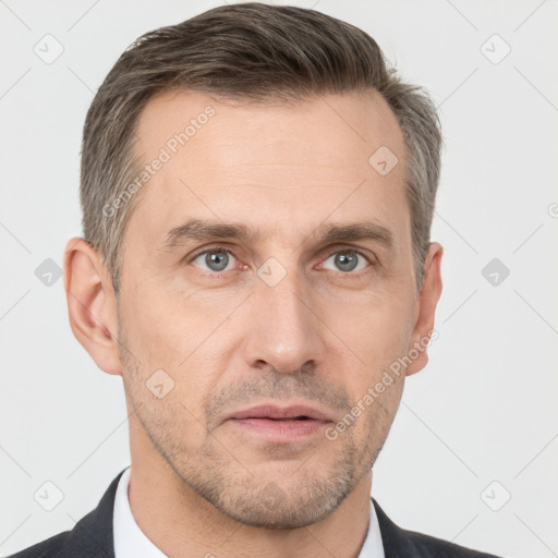 Neutral white adult male with short  brown hair and brown eyes