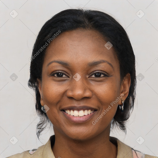 Joyful black young-adult female with medium  black hair and brown eyes