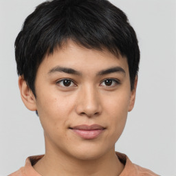 Joyful latino young-adult male with short  brown hair and brown eyes