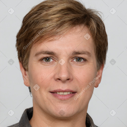 Joyful white adult male with short  brown hair and grey eyes