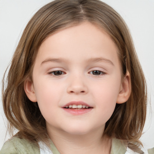 Joyful white child female with medium  brown hair and brown eyes