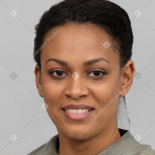 Joyful black young-adult female with short  black hair and brown eyes