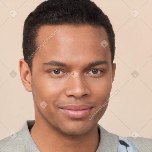 Joyful black young-adult male with short  brown hair and brown eyes