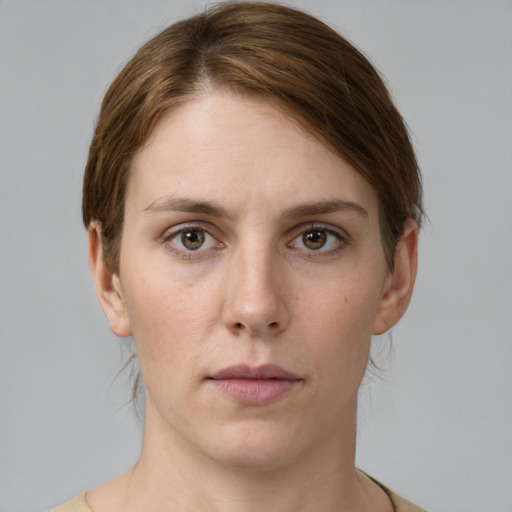 Neutral white young-adult female with short  brown hair and grey eyes