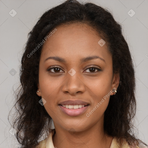 Joyful black young-adult female with long  brown hair and brown eyes