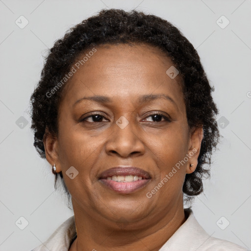 Joyful black adult female with short  brown hair and brown eyes