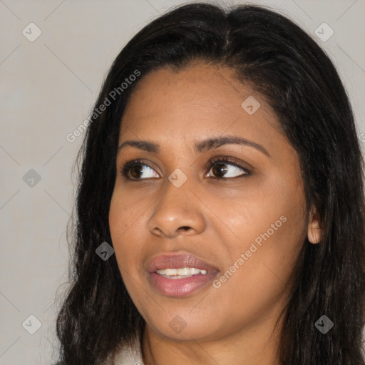 Joyful asian young-adult female with long  brown hair and brown eyes