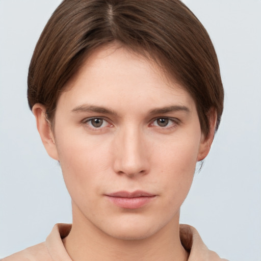 Neutral white young-adult female with short  brown hair and grey eyes