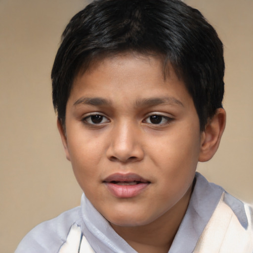 Joyful asian child female with short  brown hair and brown eyes