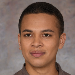 Joyful latino young-adult male with short  brown hair and brown eyes