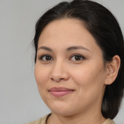 Joyful white adult female with medium  brown hair and brown eyes