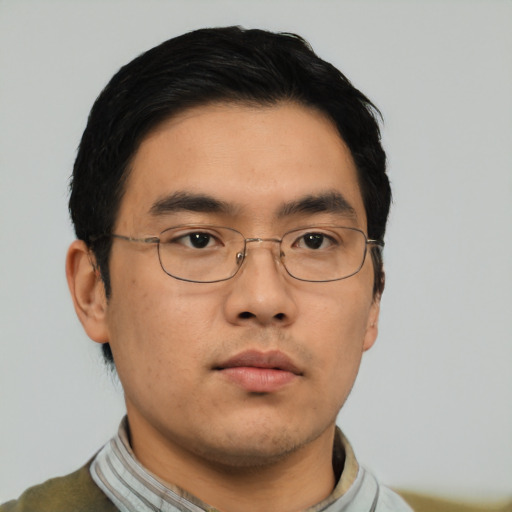Neutral asian young-adult male with short  black hair and brown eyes