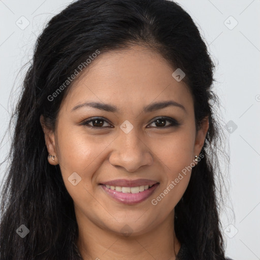 Joyful latino young-adult female with long  brown hair and brown eyes
