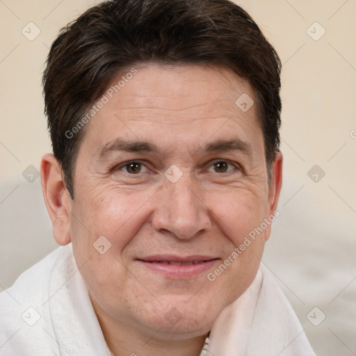 Joyful white adult male with short  brown hair and brown eyes