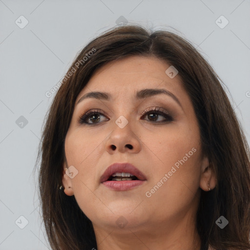 Neutral white young-adult female with long  brown hair and brown eyes