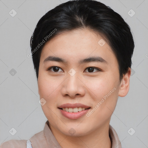 Joyful asian young-adult female with short  brown hair and brown eyes