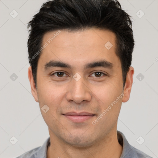 Joyful white young-adult male with short  black hair and brown eyes