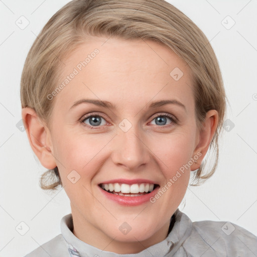 Joyful white young-adult female with medium  brown hair and blue eyes