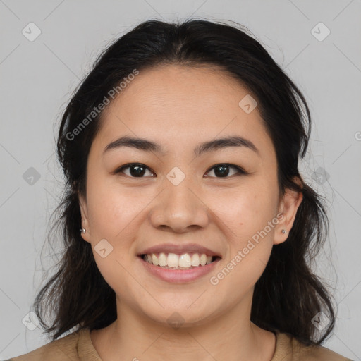 Joyful asian young-adult female with medium  brown hair and brown eyes