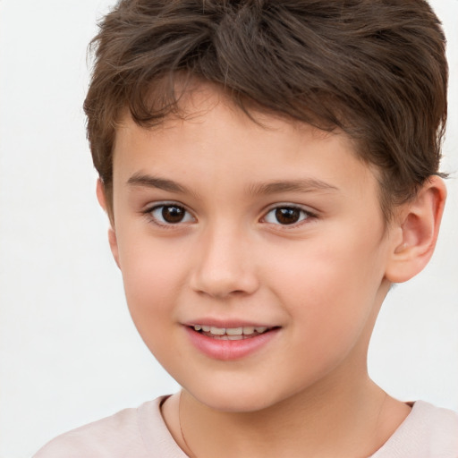 Joyful white child male with short  brown hair and brown eyes