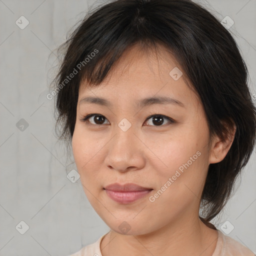Joyful asian young-adult female with medium  brown hair and brown eyes