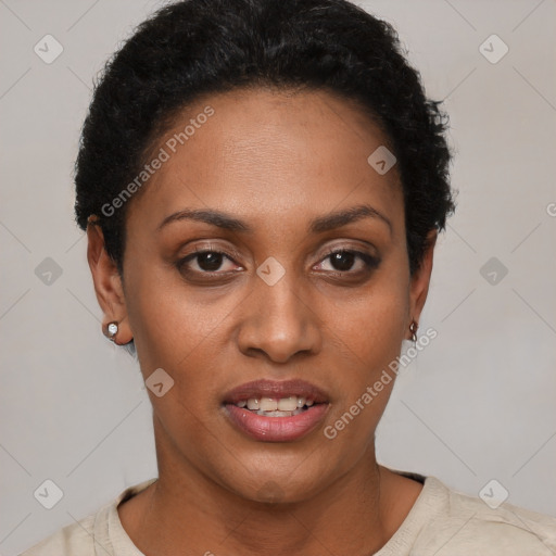 Joyful black young-adult female with short  black hair and brown eyes