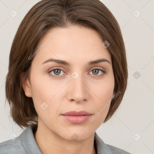 Neutral white young-adult female with medium  brown hair and grey eyes