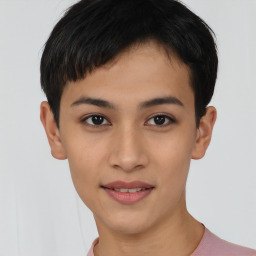 Joyful asian young-adult female with short  black hair and brown eyes