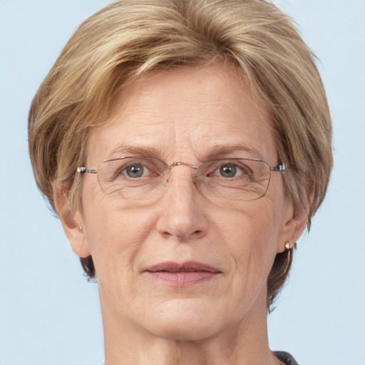 Joyful white middle-aged female with medium  brown hair and grey eyes