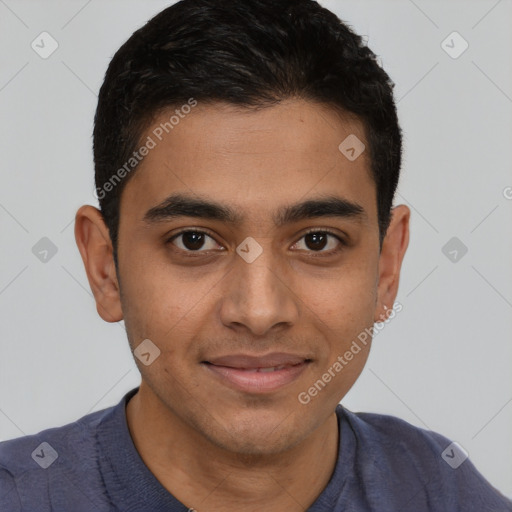 Joyful latino young-adult male with short  brown hair and brown eyes