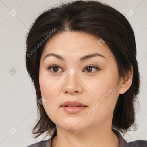 Neutral asian young-adult female with medium  brown hair and brown eyes